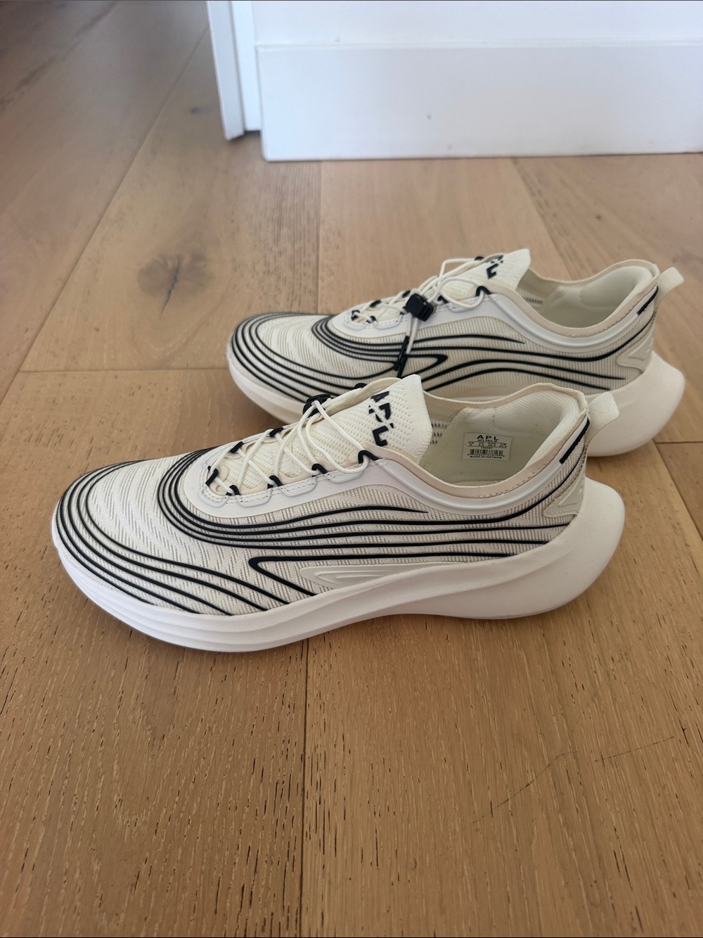 APL Kids White Sneakers with Black Stripes